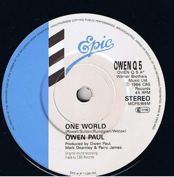 Owen Paul : One World (7", Single, Ltd, Pos)